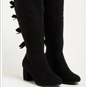 Torrid thigh high heeled boots with bows on the back wide width size 10